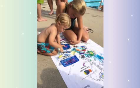 Spooshi's Colorable Towel poolside